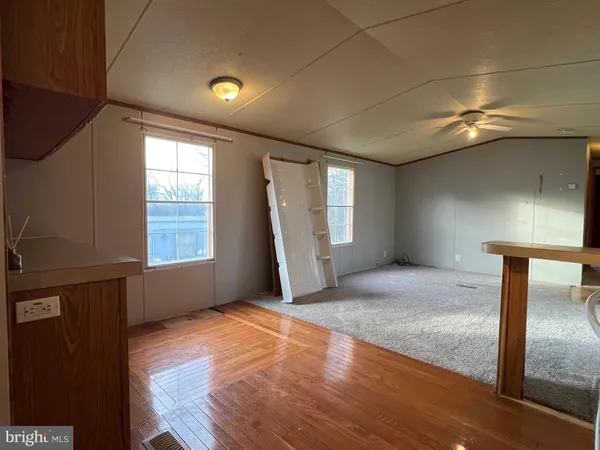a view of a livingroom with a staircase