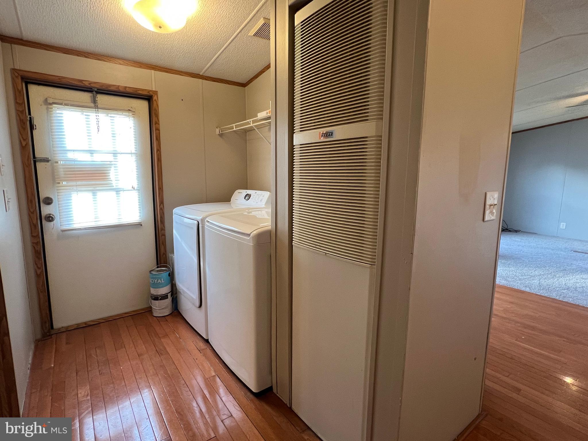 4328 Ridge Road, Unit 14 Mount Airy, MD 21771 - Photo 15 of 42 a view of a storage & utility room with wooden floor