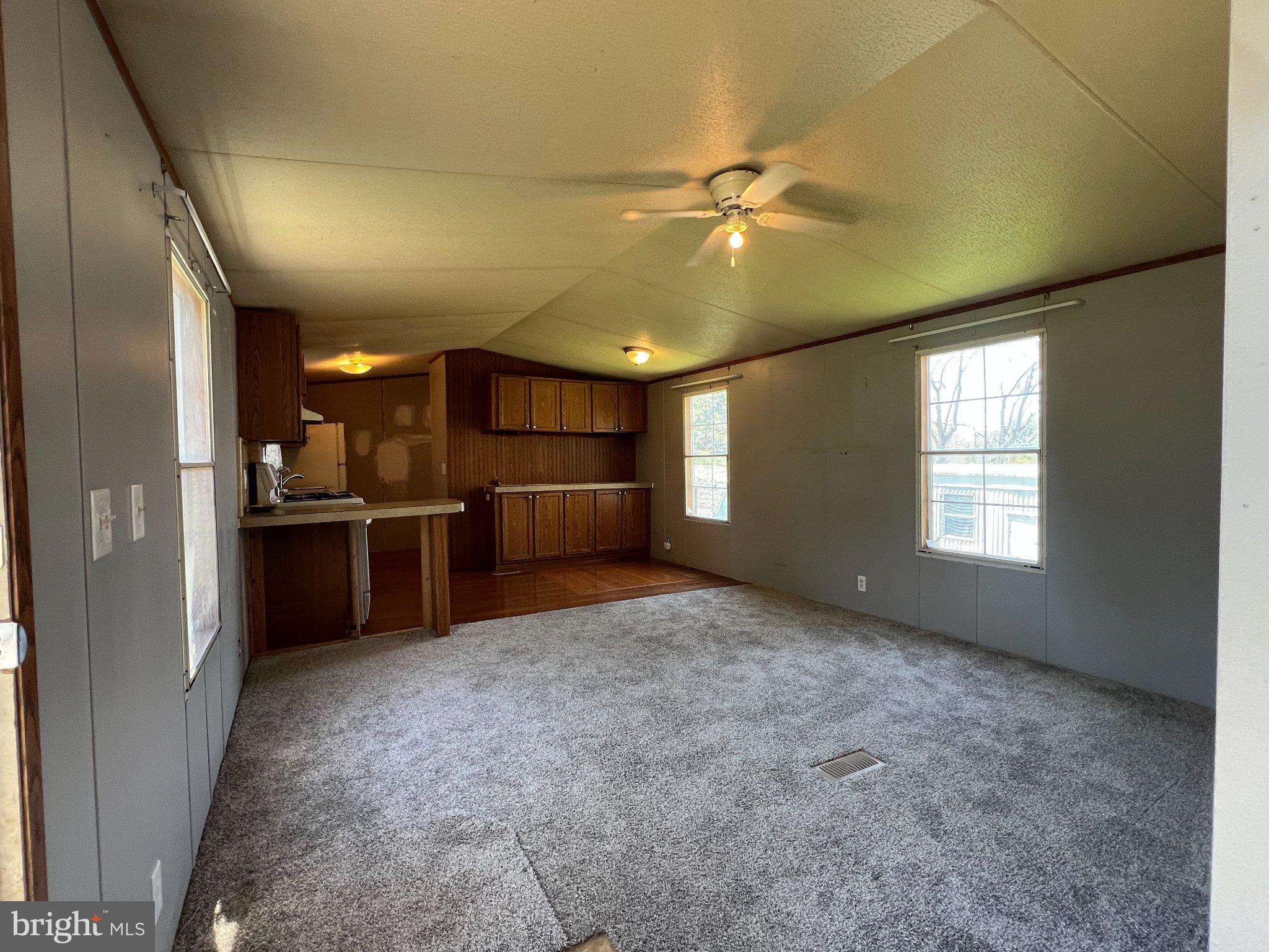4328 Ridge Road, Unit 14 Mount Airy, MD 21771 - Photo 21 of 37 Living Room w/ new carpet