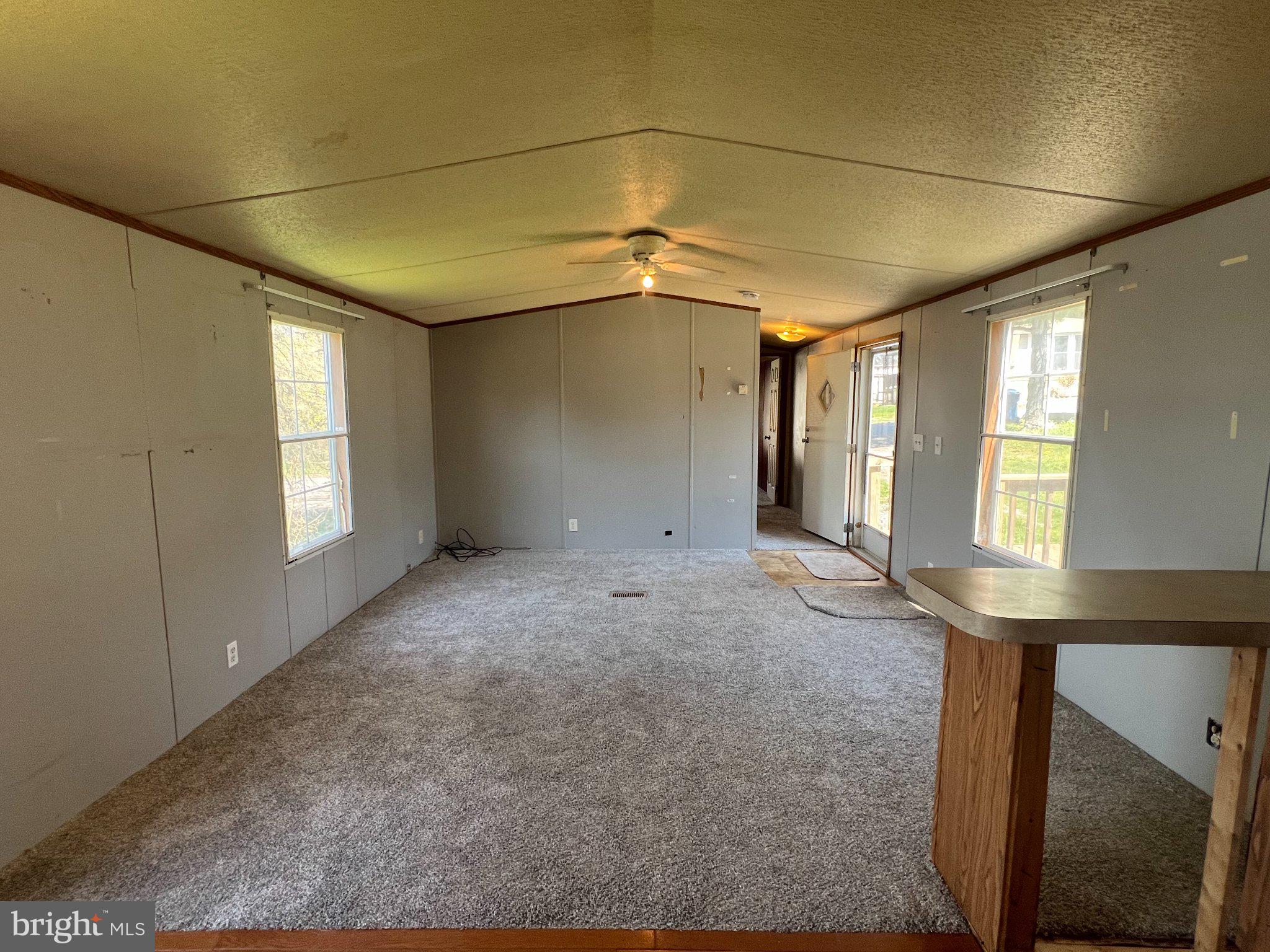 4328 Ridge Road, Unit 14 Mount Airy, MD 21771 - Photo 22 of 37 Living Room view to hall bath & bedroom #2