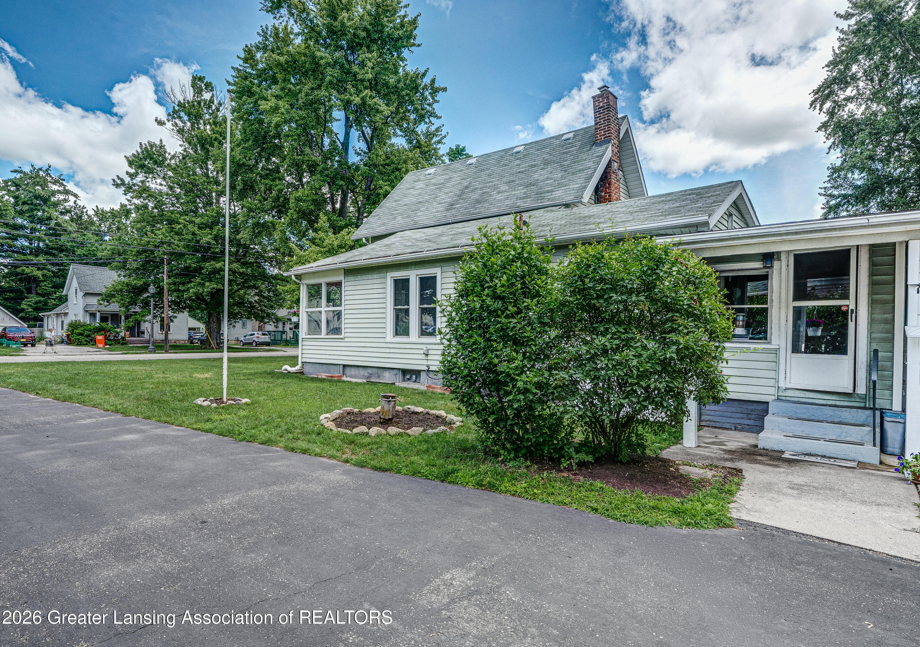 4203 Holt Road Holt, MI 48842 - Photo 23 of 32 Side