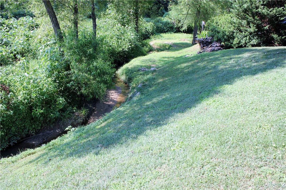 226 Rio Way Anderson, SC 29625 - Photo 8 of 16 A view of the tranquil stream that borders the hom