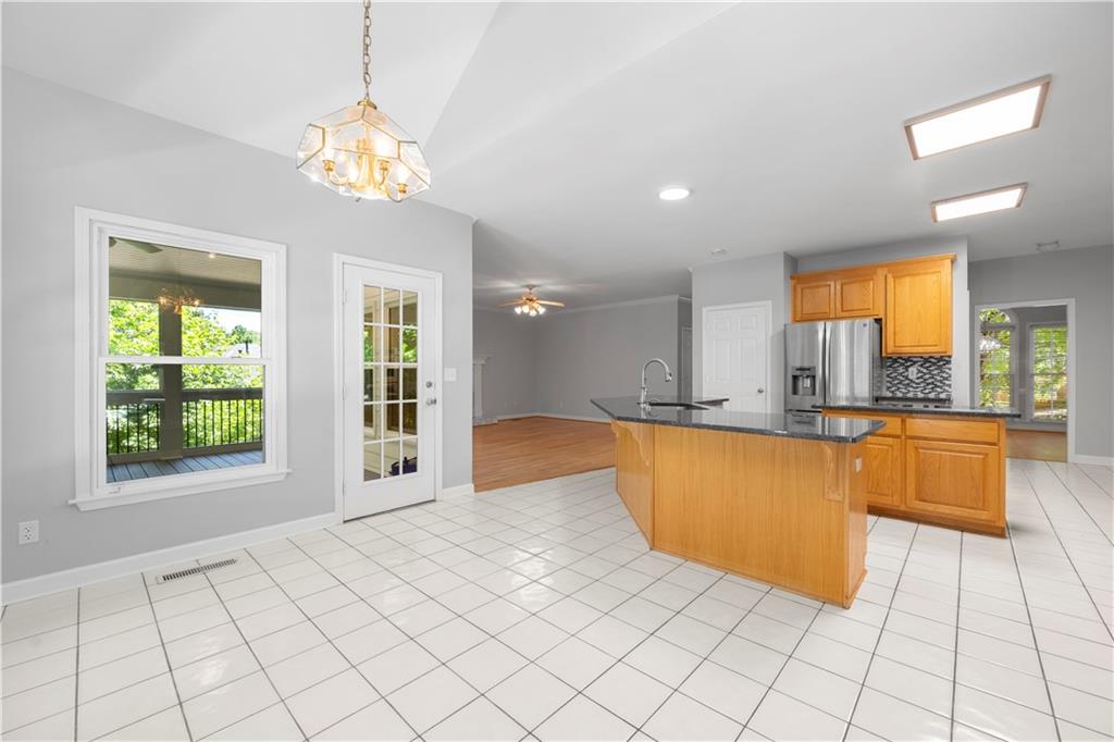 3334 Trails End Road Northeast Roswell, GA 30075 - Photo 13 of 54 a view of an empty room and window