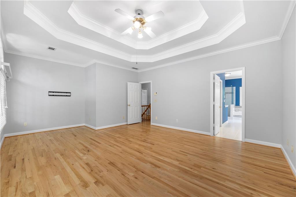 3334 Trails End Road Northeast Roswell, GA 30075 - Photo 26 of 54 a view of empty room with wooden floor