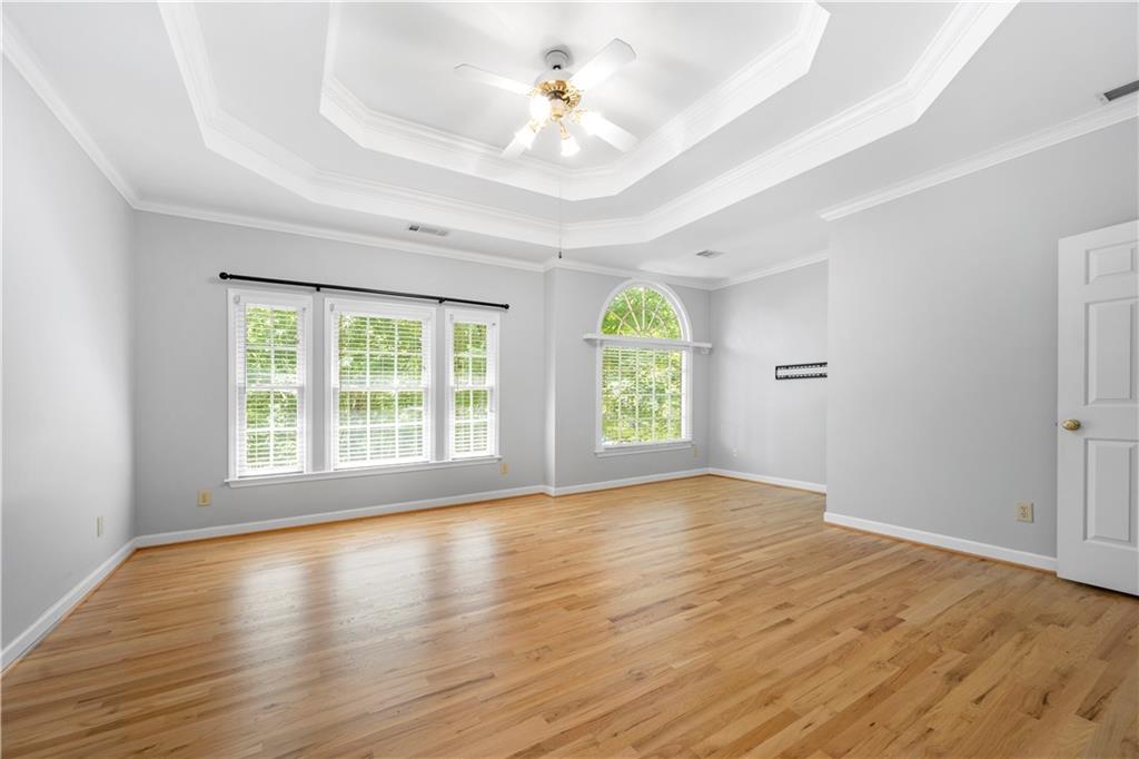 3334 Trails End Road Northeast Roswell, GA 30075 - Photo 28 of 54 wooden floor in an empty room with a window