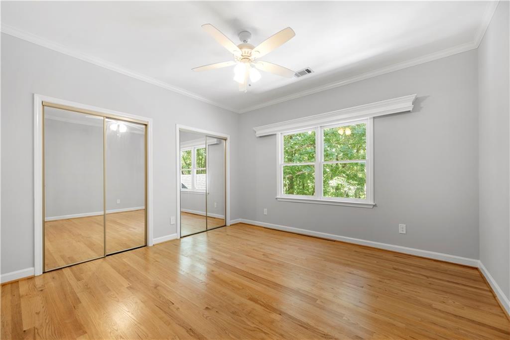 3334 Trails End Road Northeast Roswell, GA 30075 - Photo 32 of 54 wooden floor in an empty room with a window
