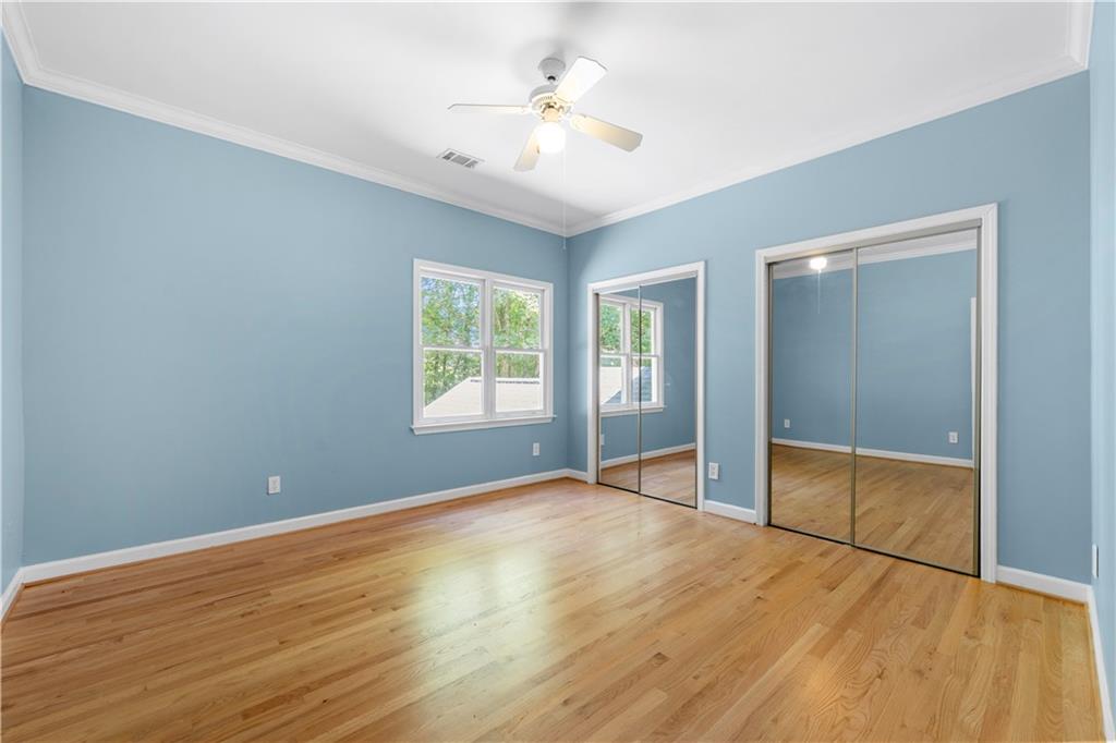 3334 Trails End Road Northeast Roswell, GA 30075 - Photo 33 of 54 wooden floor in an empty room with a window