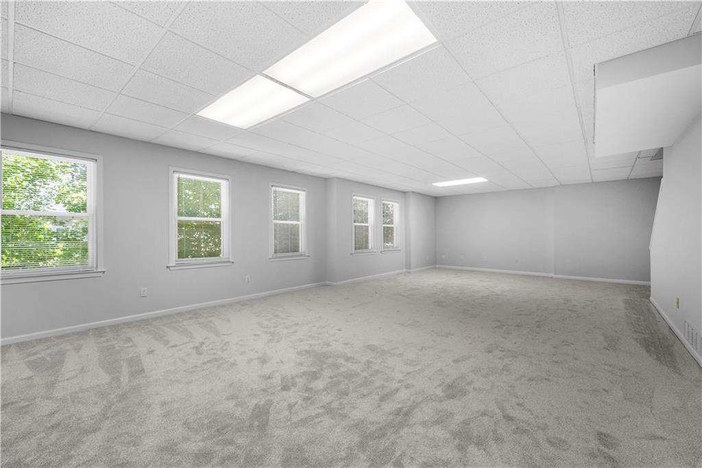 3334 Trails End Road Northeast Roswell, GA 30075 - Photo 40 of 54 an empty room with windows