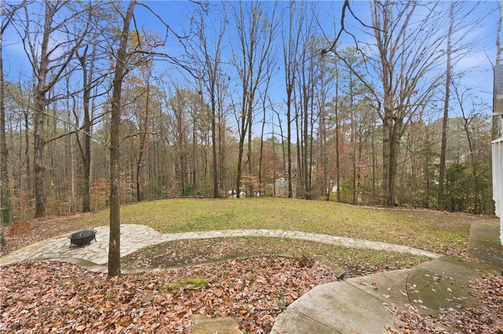 3334 Trails End Road Northeast Roswell, GA 30075 - Photo 45 of 54 a view of a yard with a trees