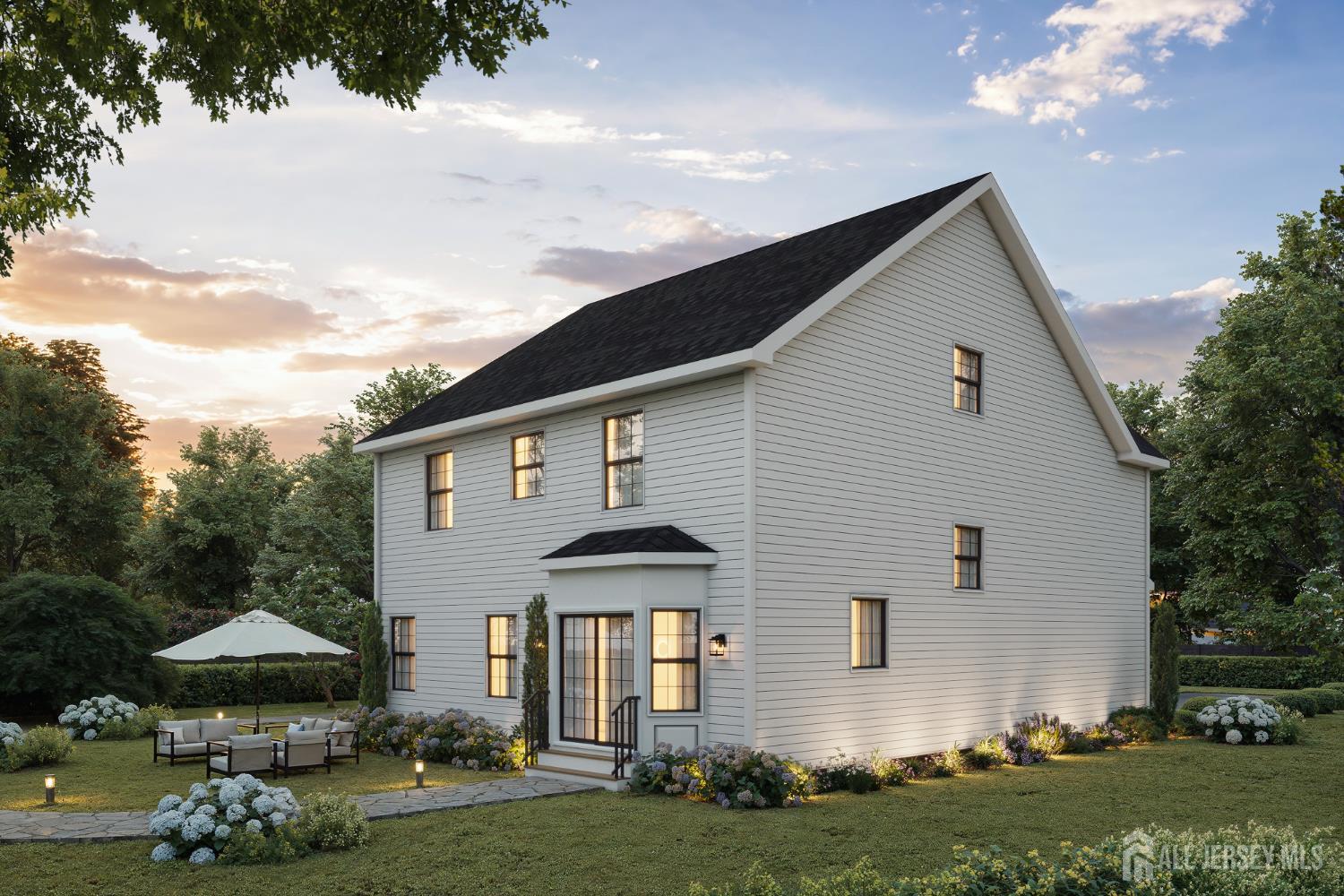 33 Apollo Avenue Avenel, NJ 07001 - Photo 5 of 11 a front view of a house with a garden