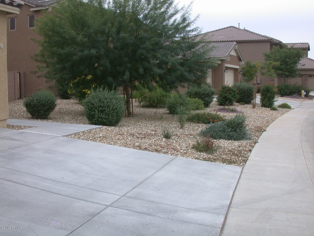 2423 West Bajada Road Phoenix, AZ 85085 - Photo 13 of 17 a front view of house with yard and green space