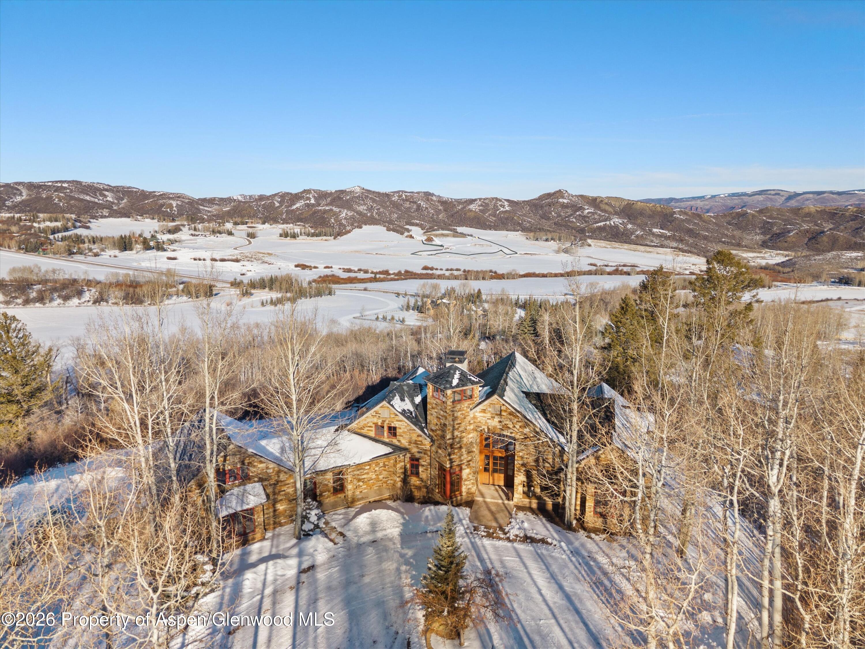 971 Cluny Road Aspen, CO 81611 - Photo 33 of 39 a view of a lake with mountain