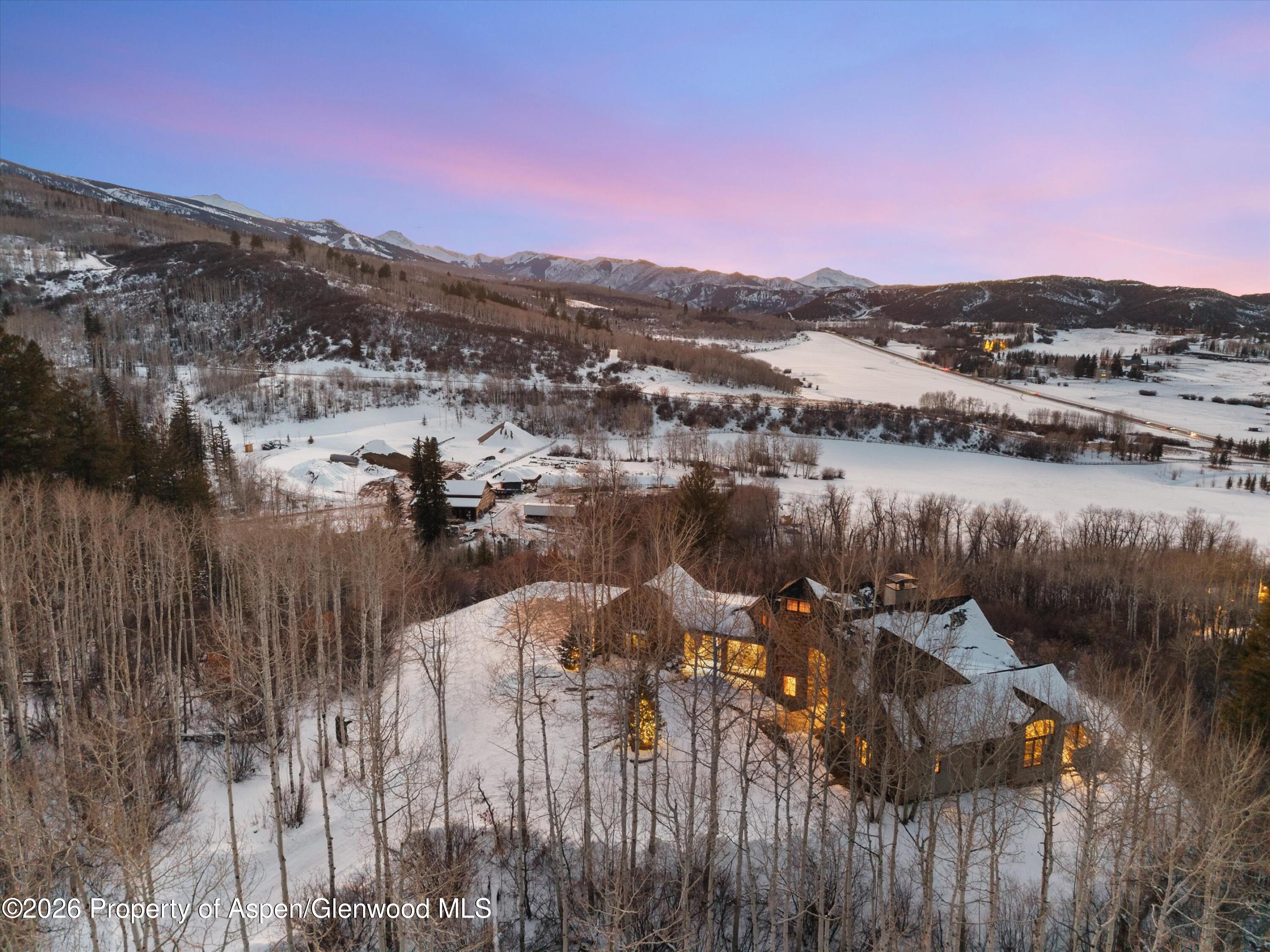 971 Cluny Road Aspen, CO 81611 - Photo 38 of 39 a view of a lake in middle of the town