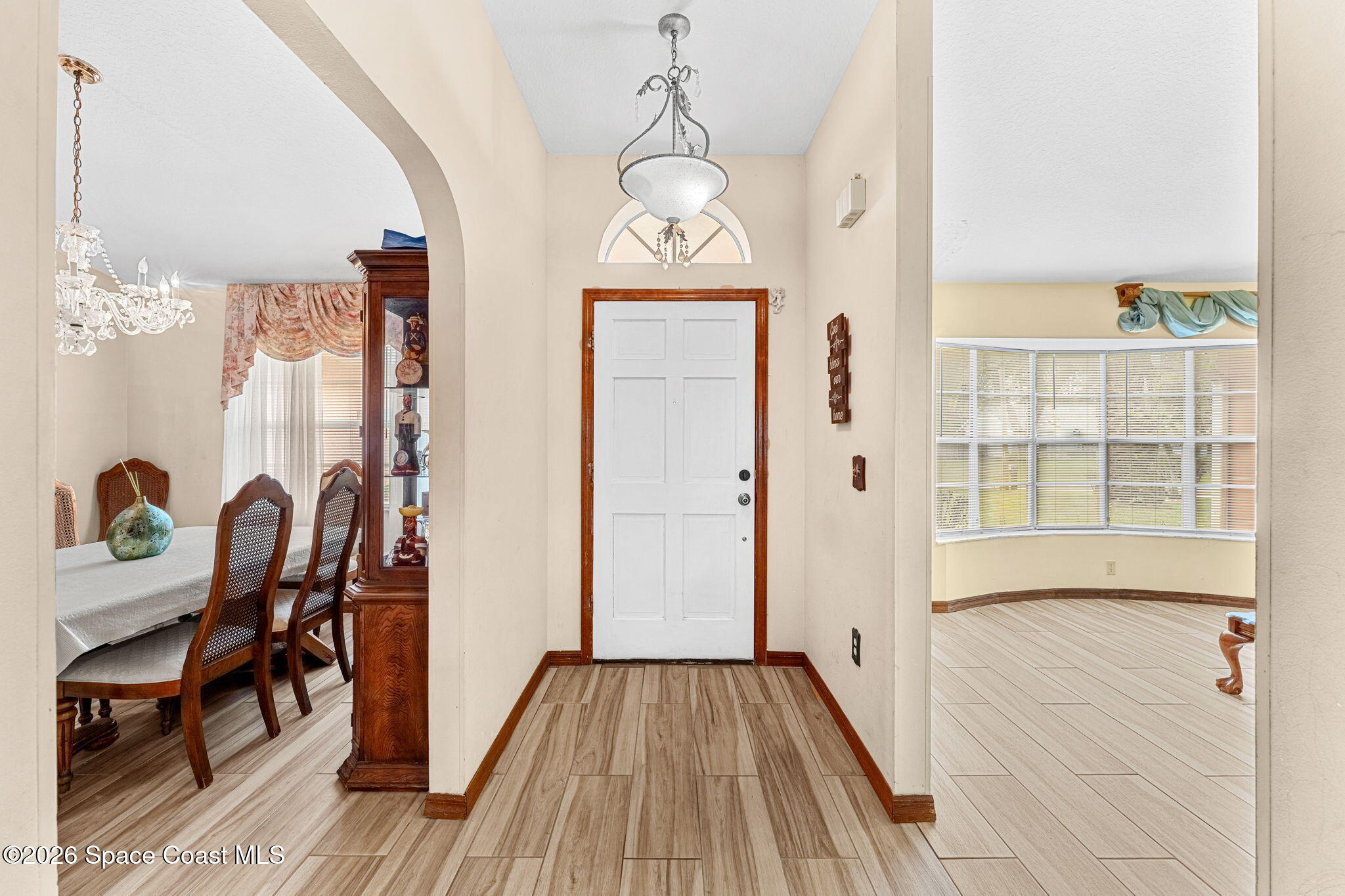 597 Balcom Terrace Southeast Palm Bay, FL 32909 - Photo 3 of 47 Foyer Views