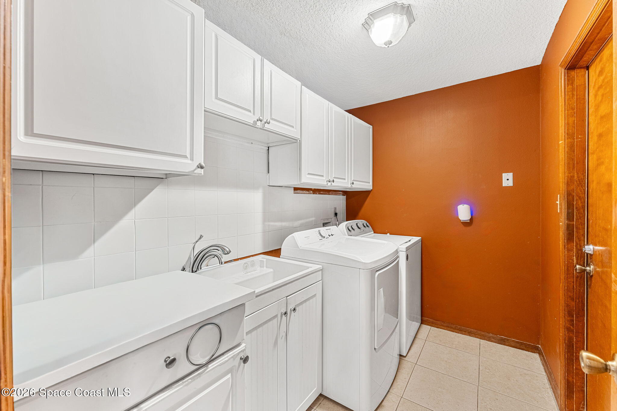 597 Balcom Terrace Southeast Palm Bay, FL 32909 - Photo 31 of 47 Laundry Room Views