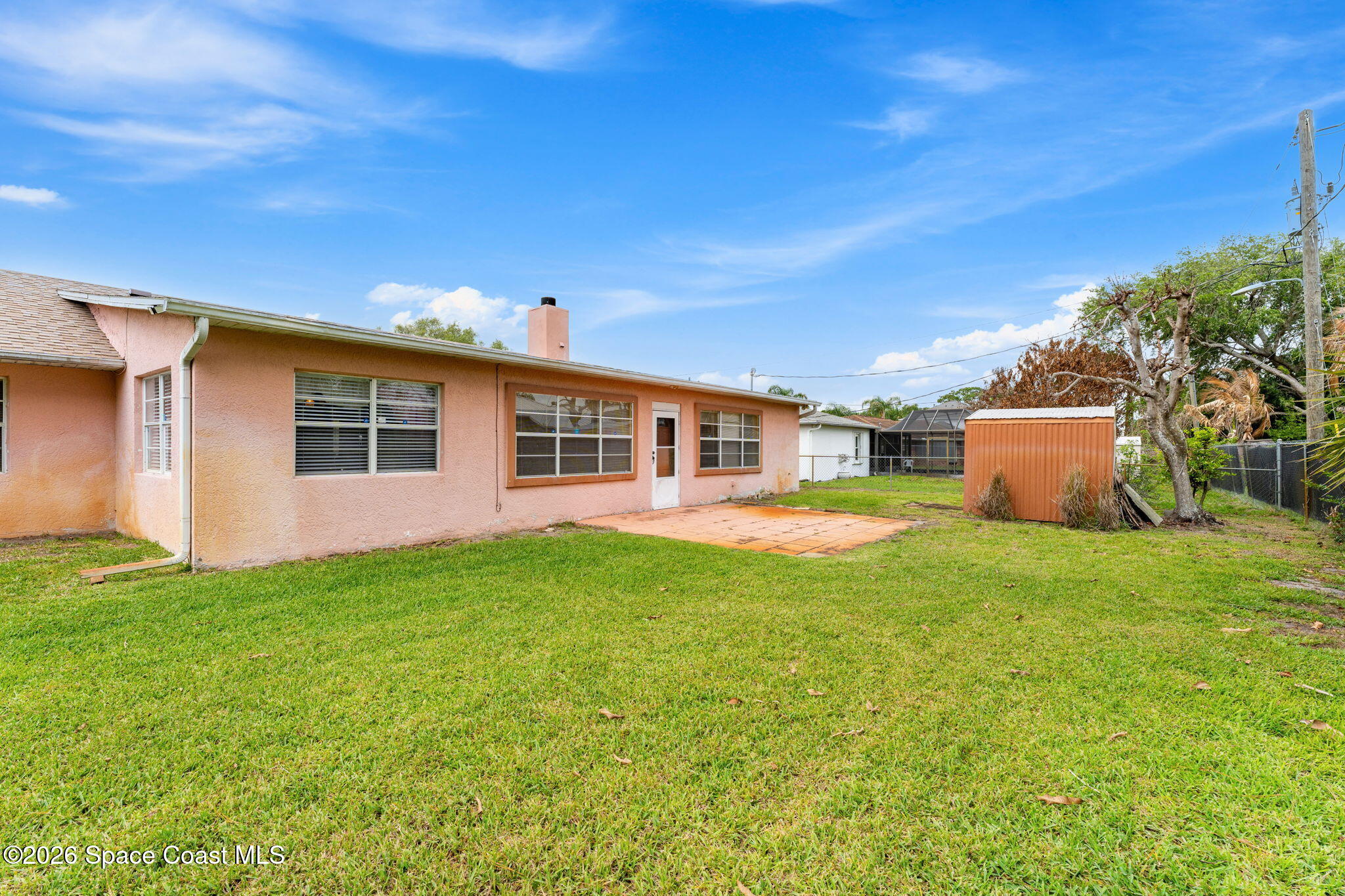 597 Balcom Terrace Southeast Palm Bay, FL 32909 - Photo 33 of 47 Backyard Views