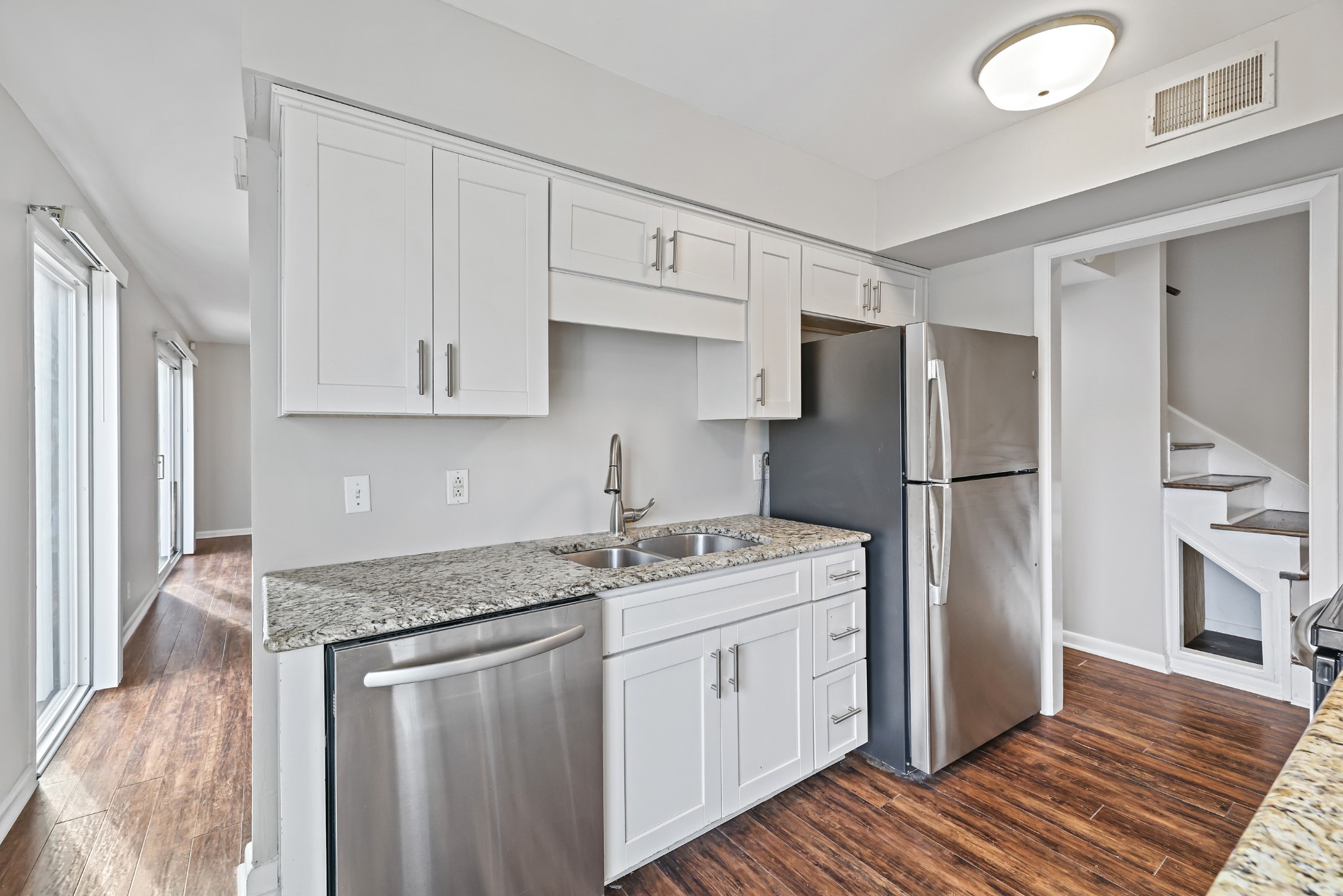 1900 Richard Jones Road, Unit V10 Nashville, TN 37215 - Photo 11 of 49 a kitchen with stainless steel appliances granite countertop a refrigerator sink and cabinets