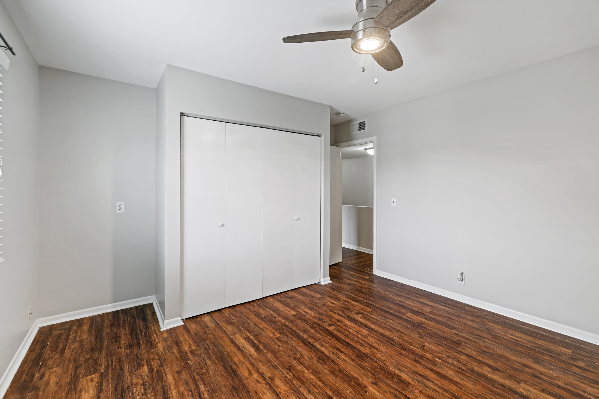 1900 Richard Jones Road, Unit V10 Nashville, TN 37215 - Photo 29 of 49 a view of an empty room with wooden floor