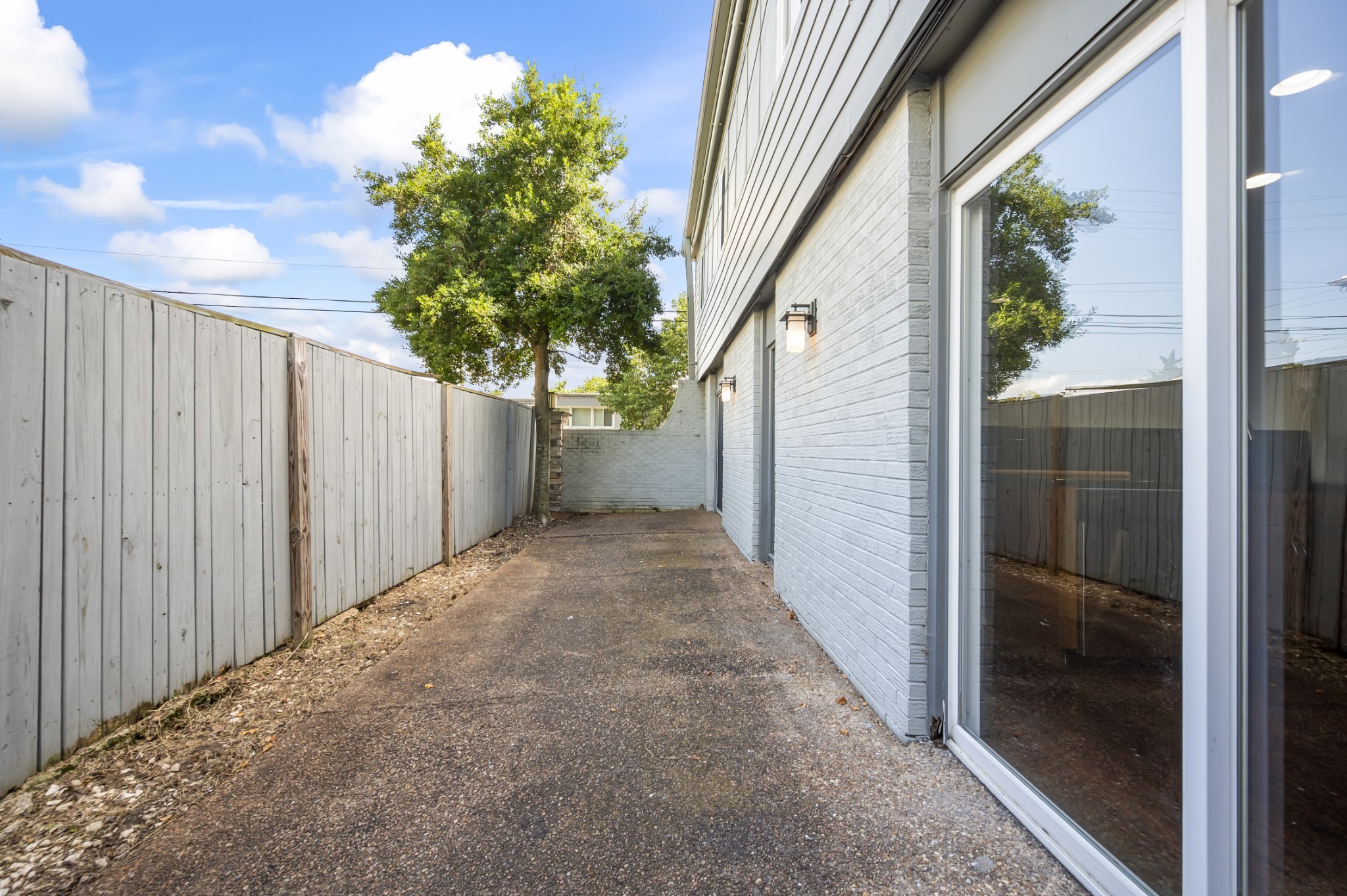 1900 Richard Jones Road, Unit V10 Nashville, TN 37215 - Photo 31 of 49 a view of a porch with a trees