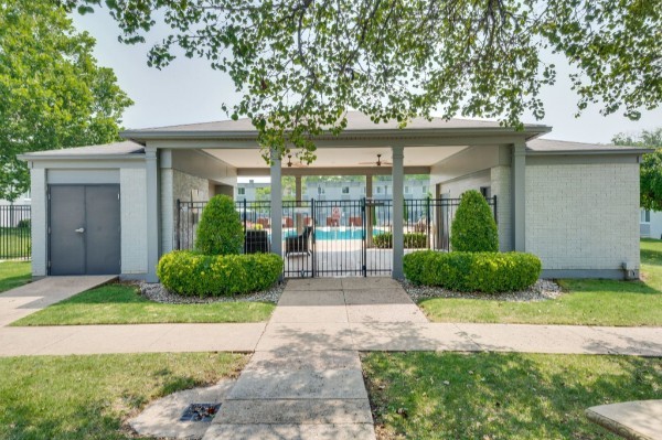 1900 Richard Jones Road, Unit V10 Nashville, TN 37215 - Photo 37 of 49 a view of a house with a small yard plants and large tree