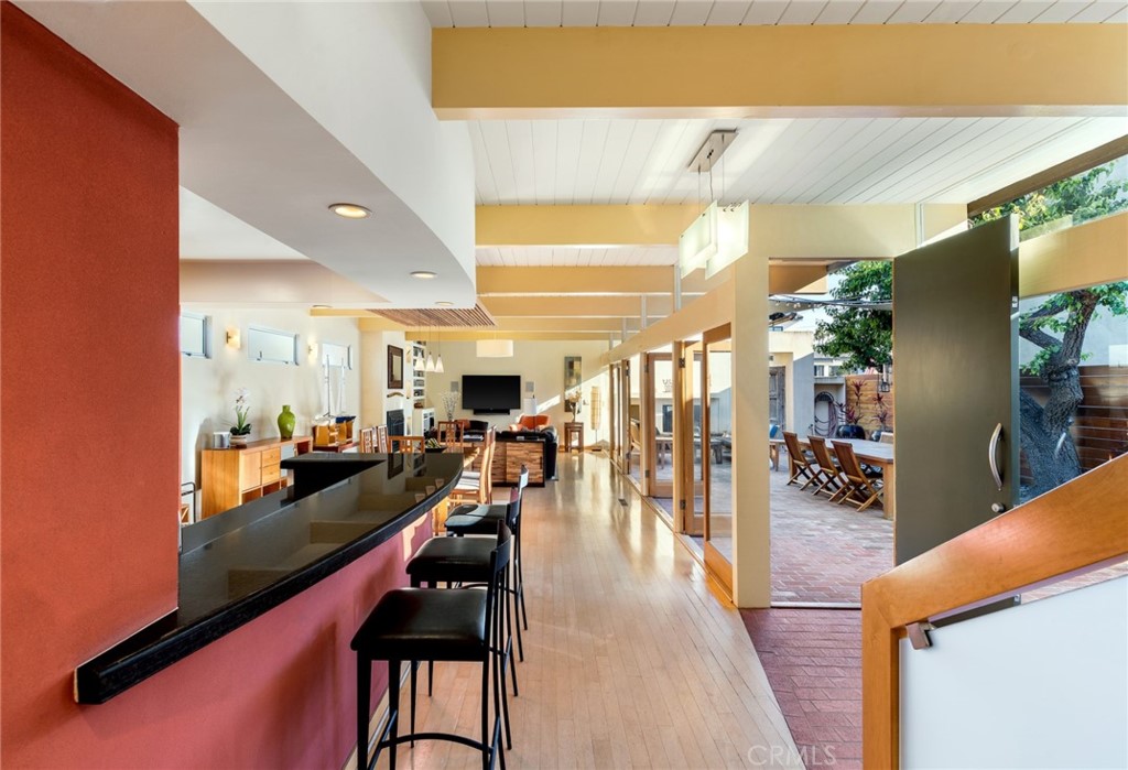 253 Ancona Drive Long Beach, CA 90803 - Photo 11 of 39 a living room with furniture and a flat screen tv