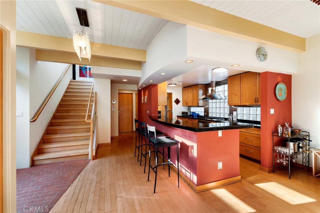 253 Ancona Drive Long Beach, CA 90803 - Photo 12 of 39 a kitchen view of a table and chairs in it