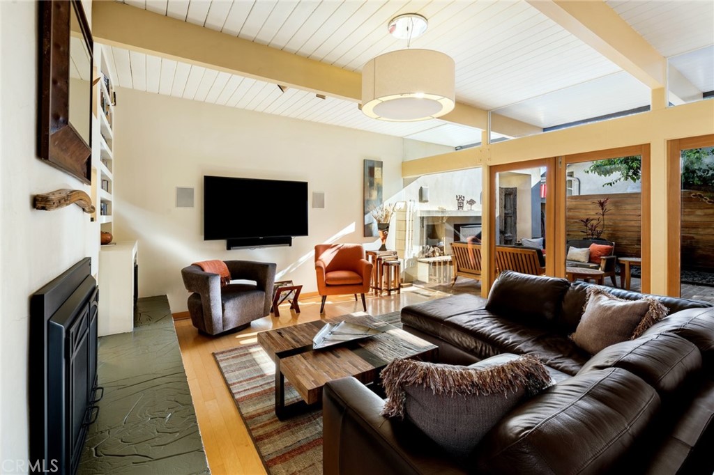 253 Ancona Drive Long Beach, CA 90803 - Photo 13 of 39 a living room with furniture and a flat screen tv