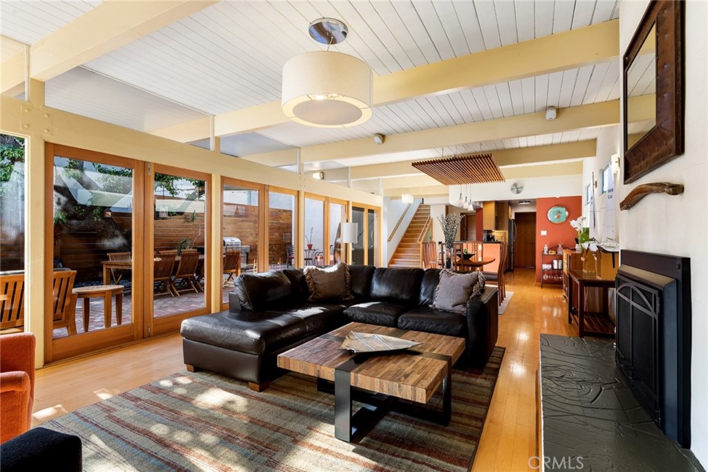 253 Ancona Drive Long Beach, CA 90803 - Photo 14 of 39 a living room with furniture and a fireplace