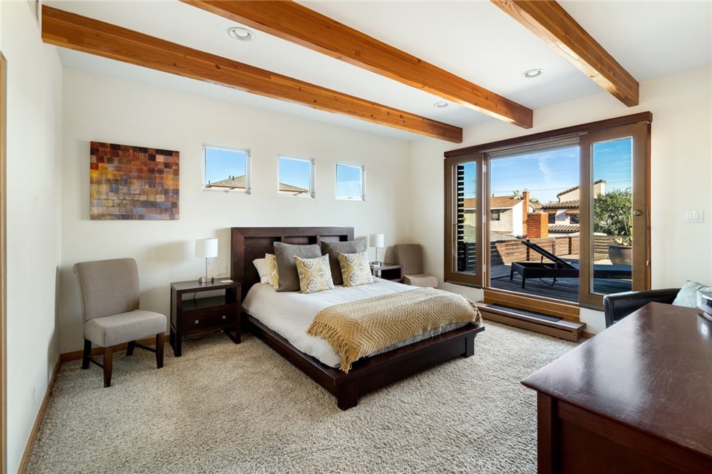 253 Ancona Drive Long Beach, CA 90803 - Photo 26 of 39 a bedroom with a bed and a couch