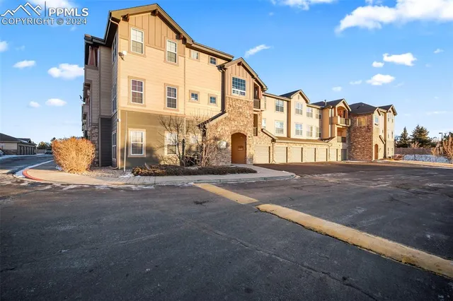 a view of a building with a street