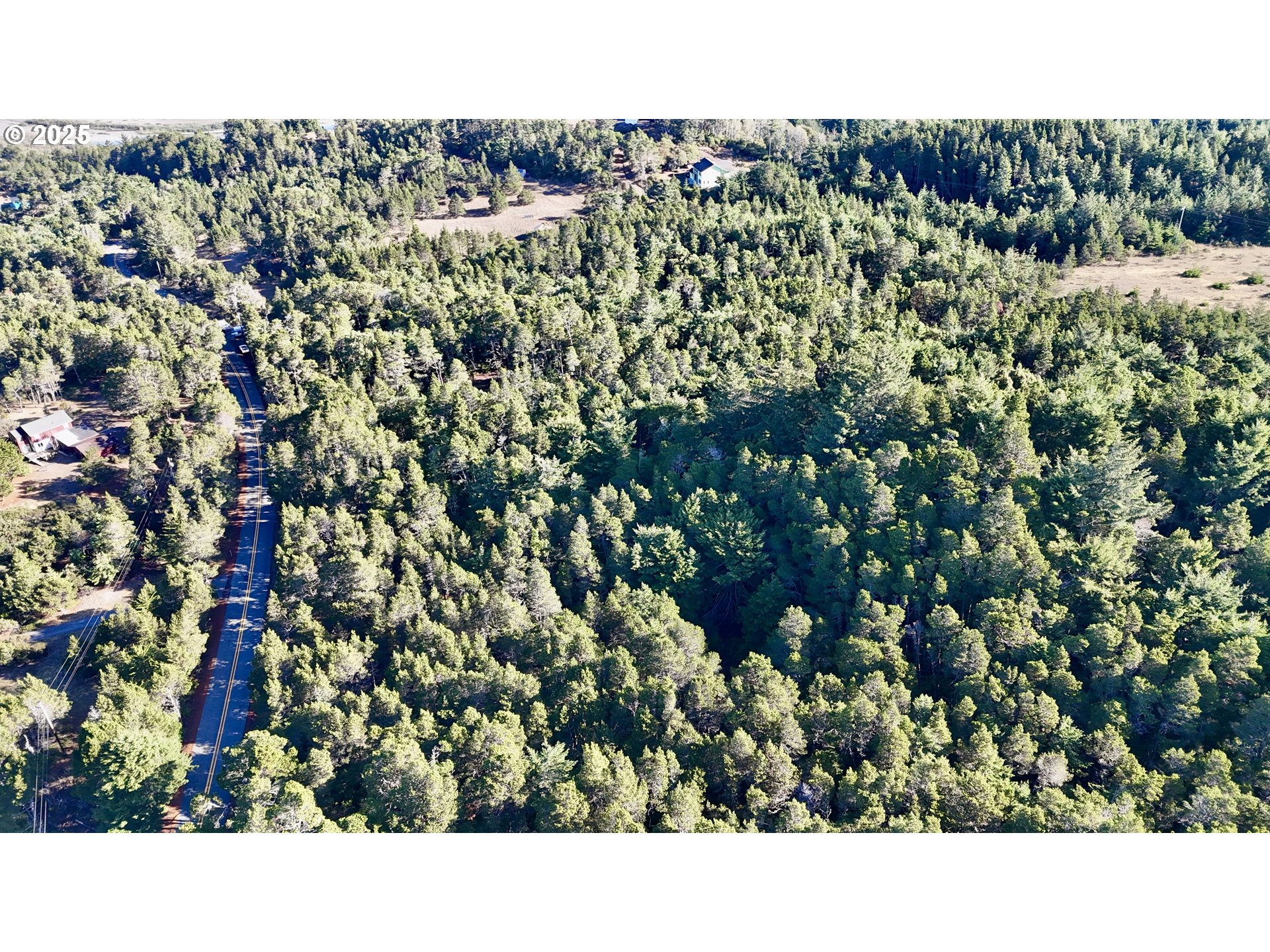 Carpenterville Road, Unit 41/42 Brookings, OR 97415 - Photo 25 of 32 a black and white photo of a house