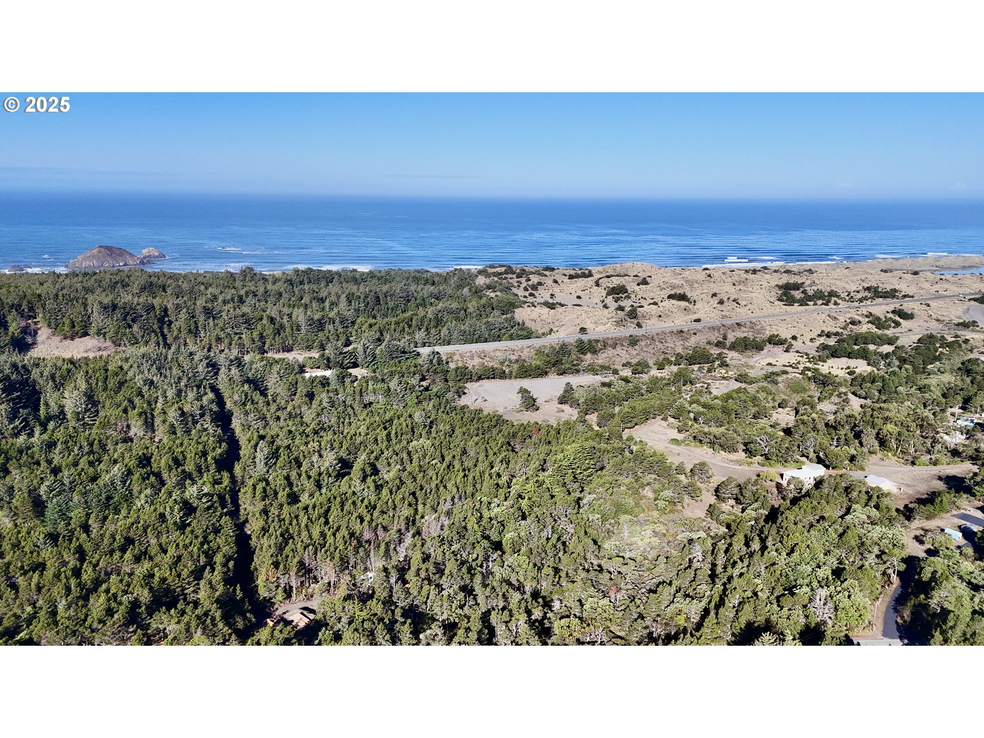 Carpenterville Road, Unit 41/42 Brookings, OR 97415 - Photo 31 of 32 a open area with trees in the background