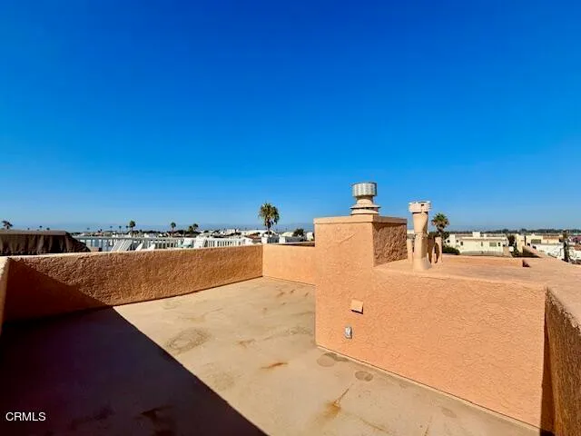 a view of a terrace with lake view and mountain view