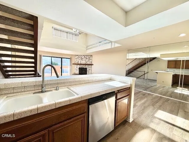 a kitchen with a sink a counter and appliances