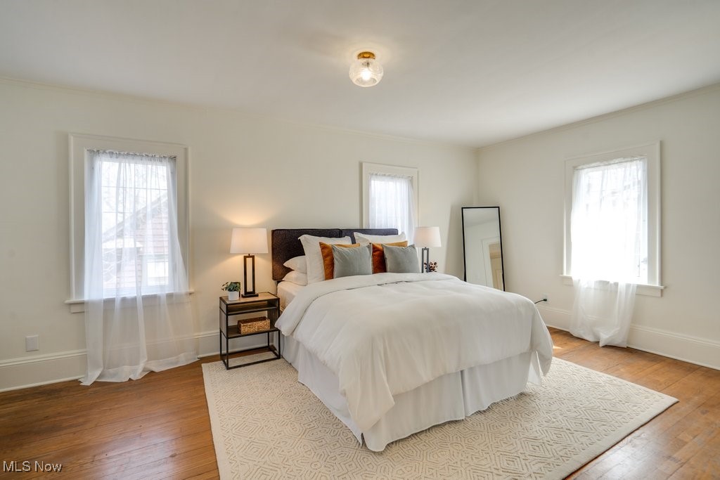 199 Edgerton Road Akron, OH 44303 - Photo 37 of 49 Bedroom featuring light wood-style floors and baseboards