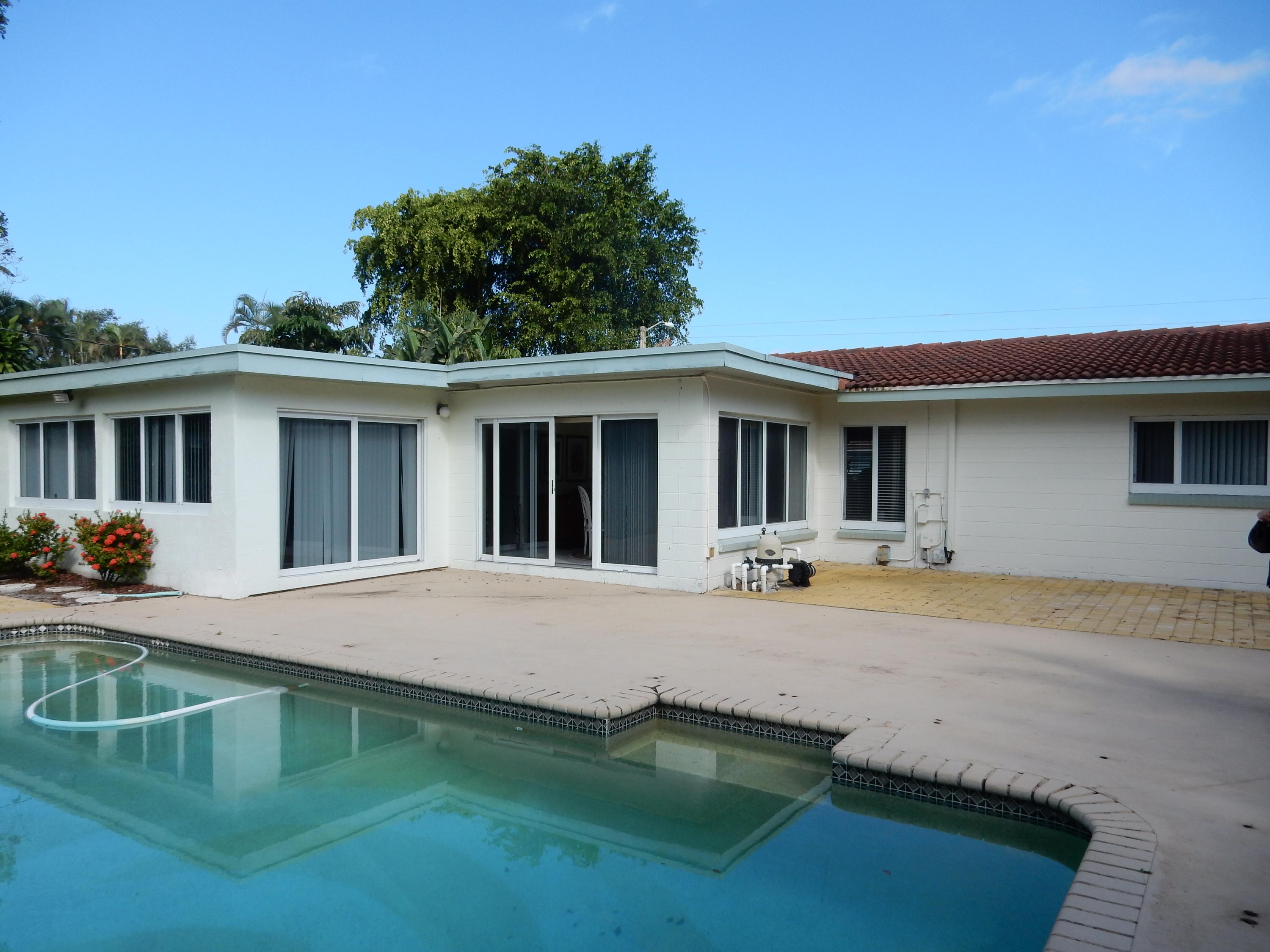 20 Forest Hills Lane Boca Raton, FL 33431 - Photo 2 of 36 20 back and pool
