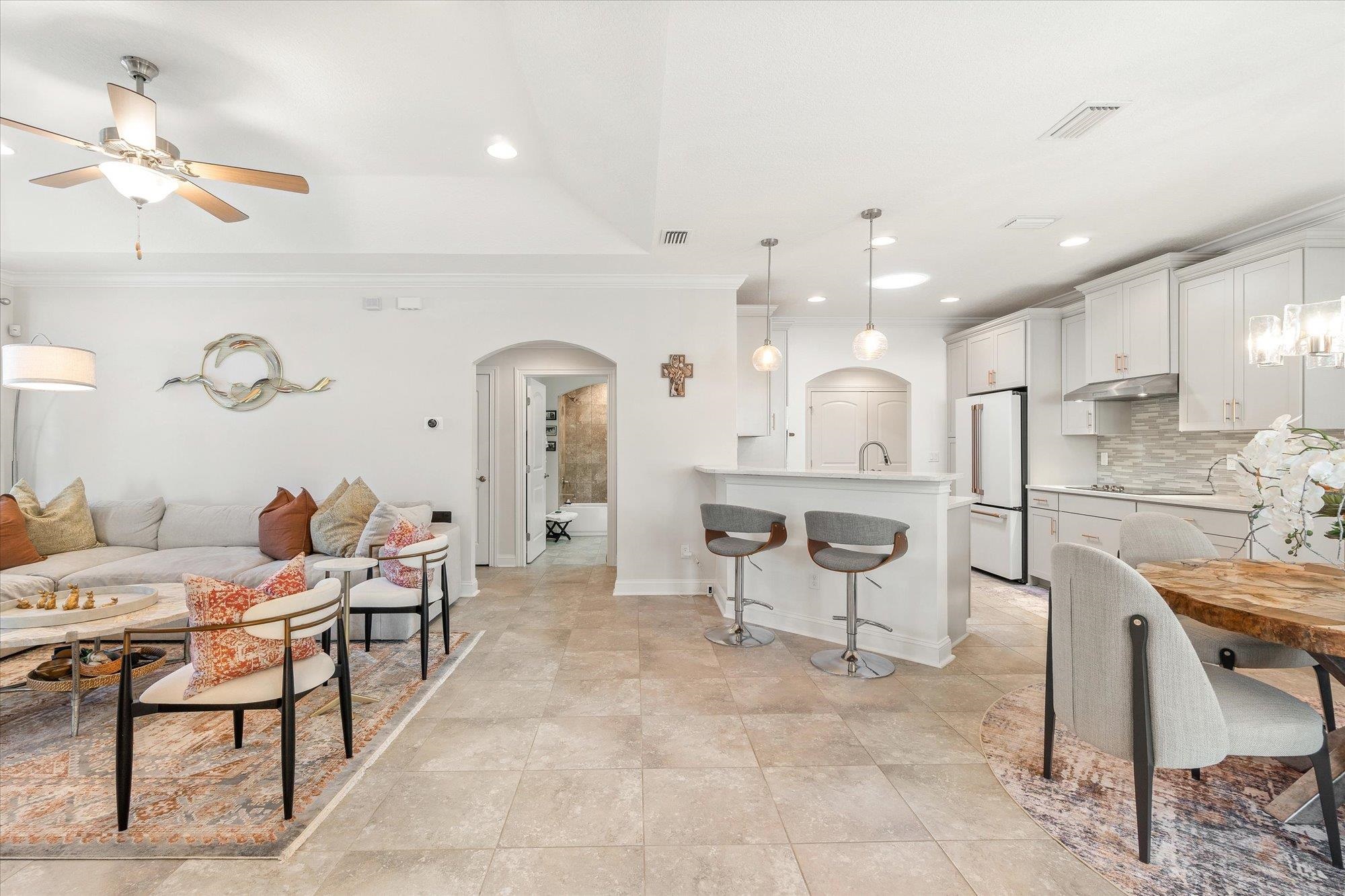 82 Timoga Trail St. Augustine, FL 32084 - Photo 12 of 62 a living room with furniture a table and chairs
