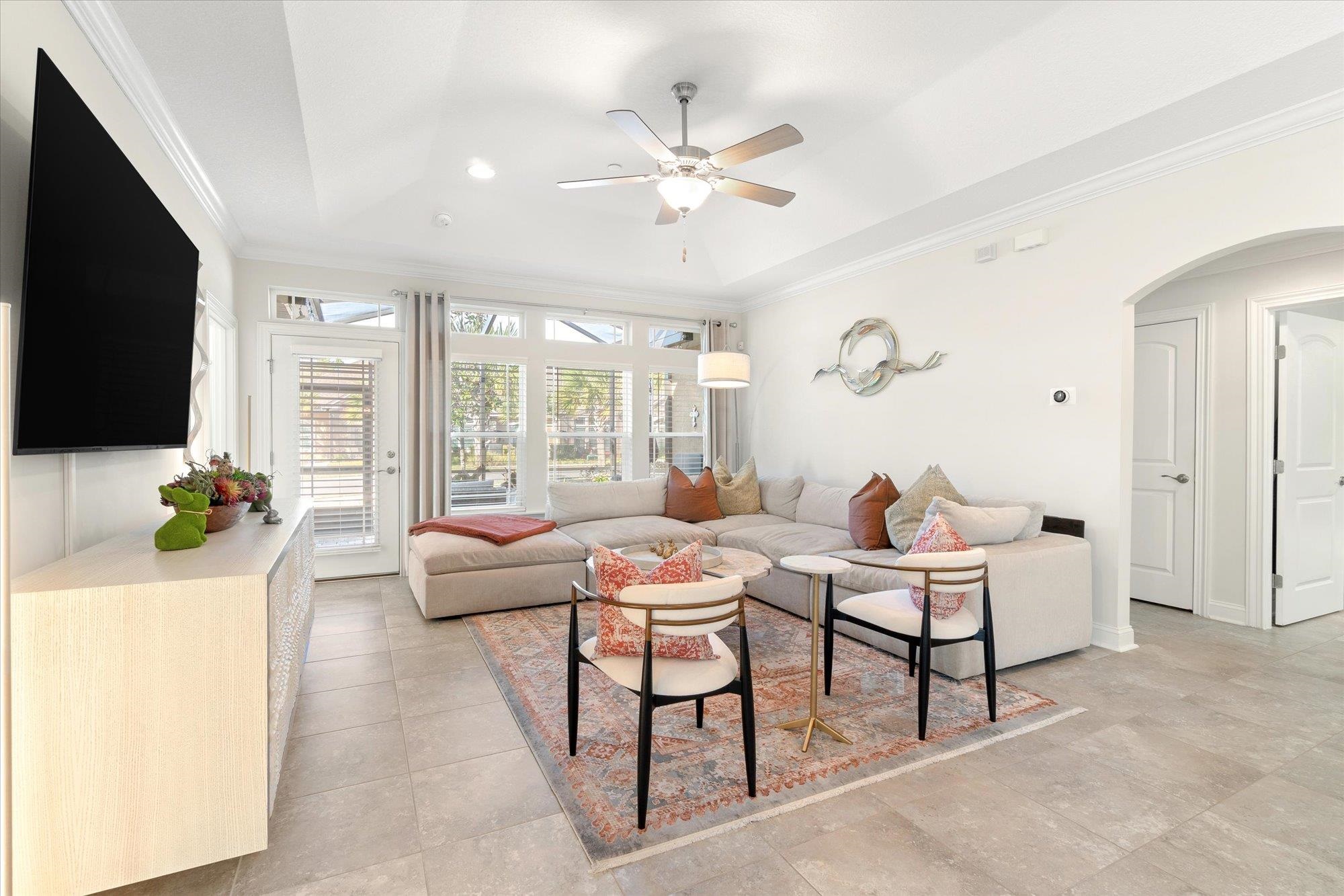 82 Timoga Trail St. Augustine, FL 32084 - Photo 15 of 62 a living room with furniture and a flat screen tv