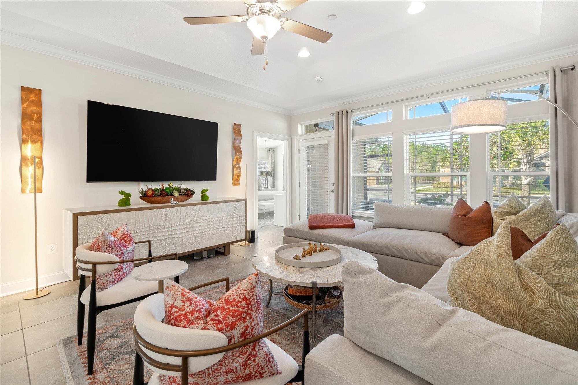 82 Timoga Trail St. Augustine, FL 32084 - Photo 17 of 62 a living room with furniture and a flat screen tv