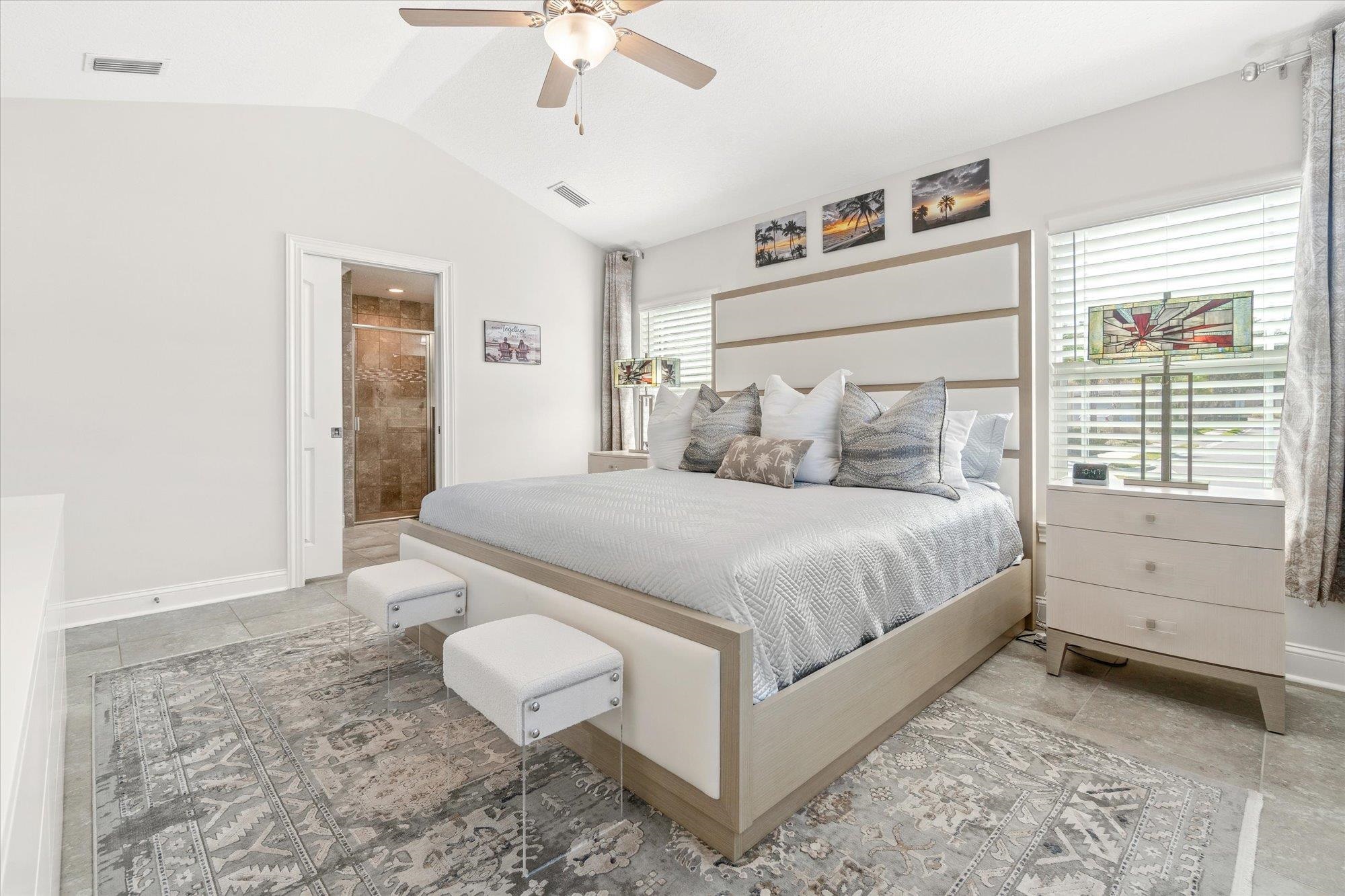 82 Timoga Trail St. Augustine, FL 32084 - Photo 25 of 62 a spacious bedroom with a bed and a window