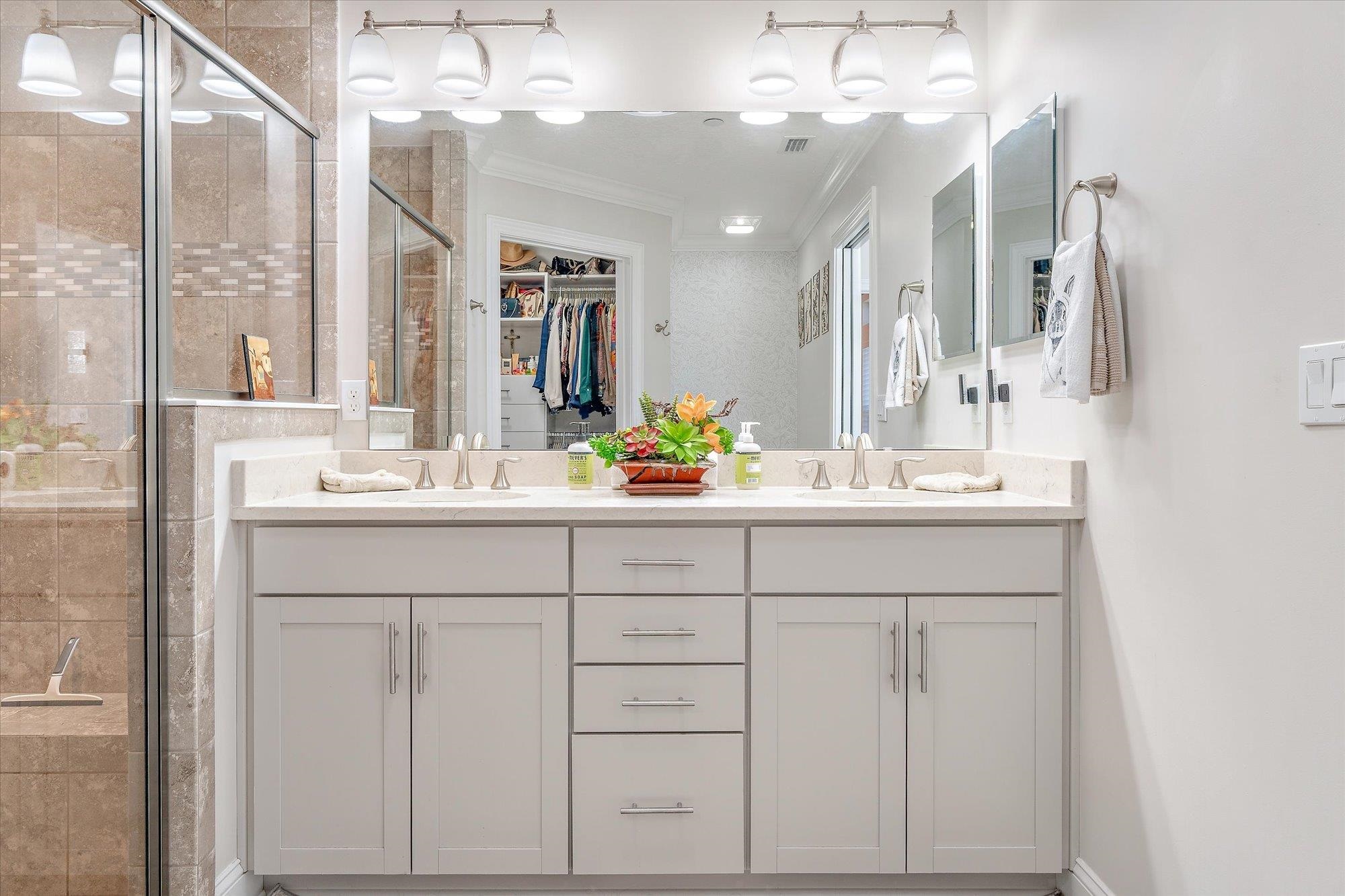 82 Timoga Trail St. Augustine, FL 32084 - Photo 27 of 62 a bathroom with a sink double vanity and a mirror