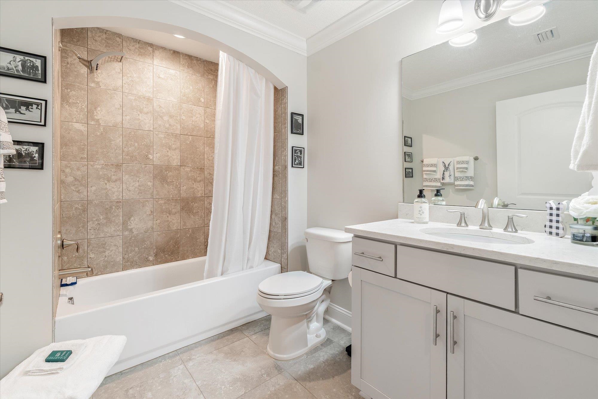 82 Timoga Trail St. Augustine, FL 32084 - Photo 29 of 62 a bathroom with a sink toilet and shower