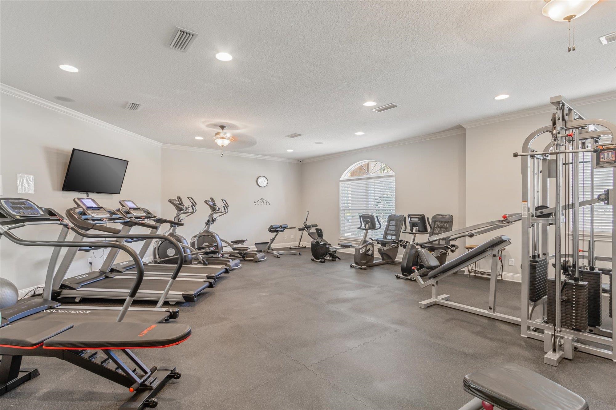 82 Timoga Trail St. Augustine, FL 32084 - Photo 3 of 62 a view of a room with gym equipment