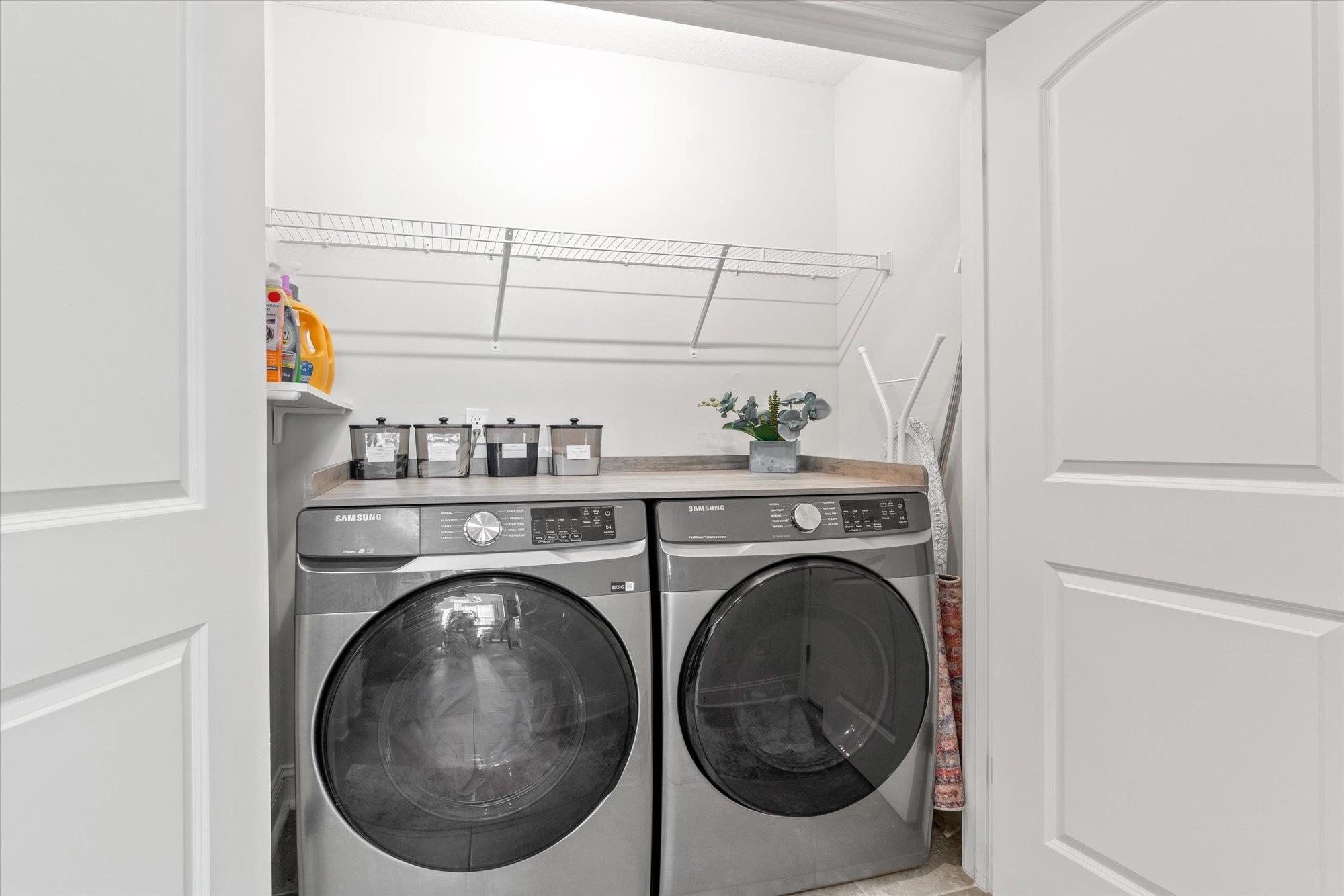 82 Timoga Trail St. Augustine, FL 32084 - Photo 32 of 62 a utility room with dryer and washer