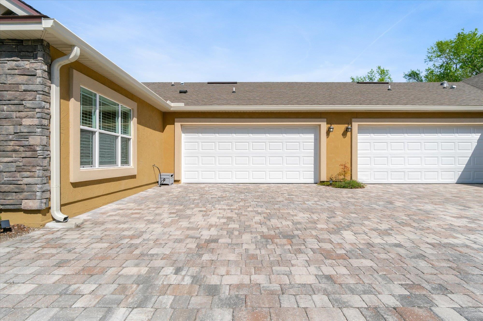 82 Timoga Trail St. Augustine, FL 32084 - Photo 34 of 62 a view of house with backyard and trees in the background
