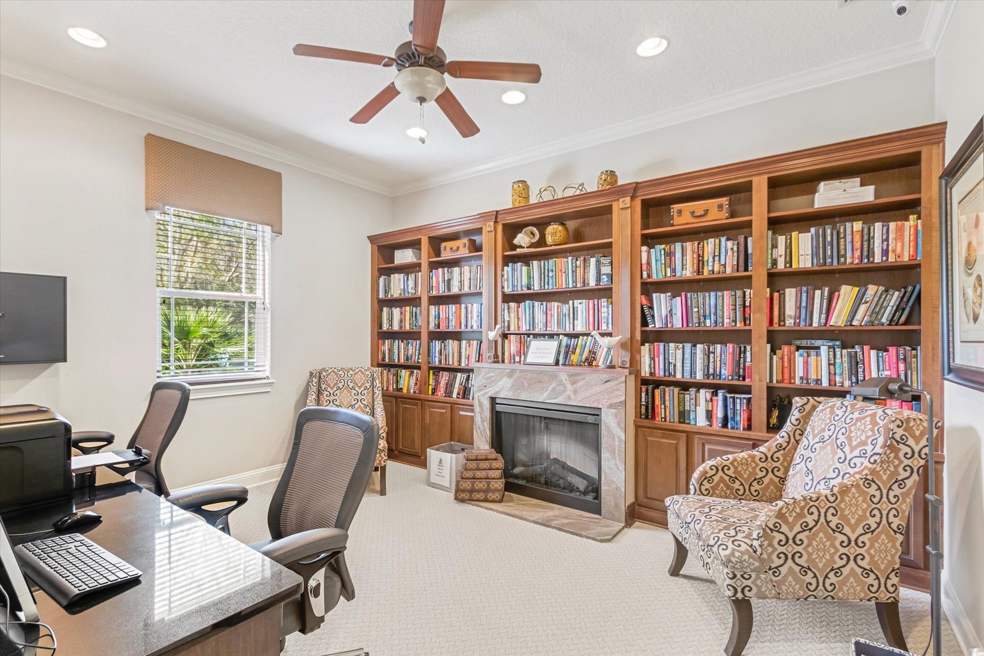 82 Timoga Trail St. Augustine, FL 32084 - Photo 4 of 62 a view of a livingroom with furniture and a fireplace