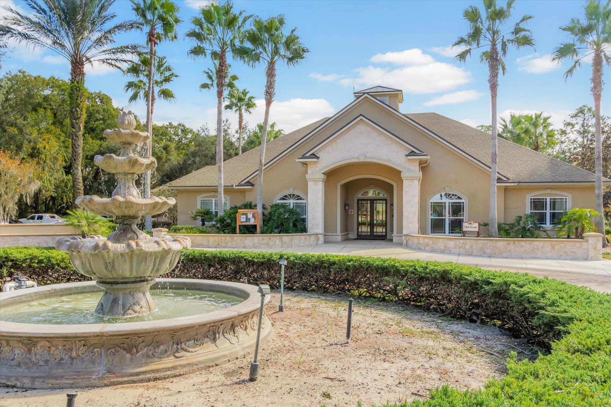 82 Timoga Trail St. Augustine, FL 32084 - Photo 57 of 62 a view of a house with a yard and a fountain