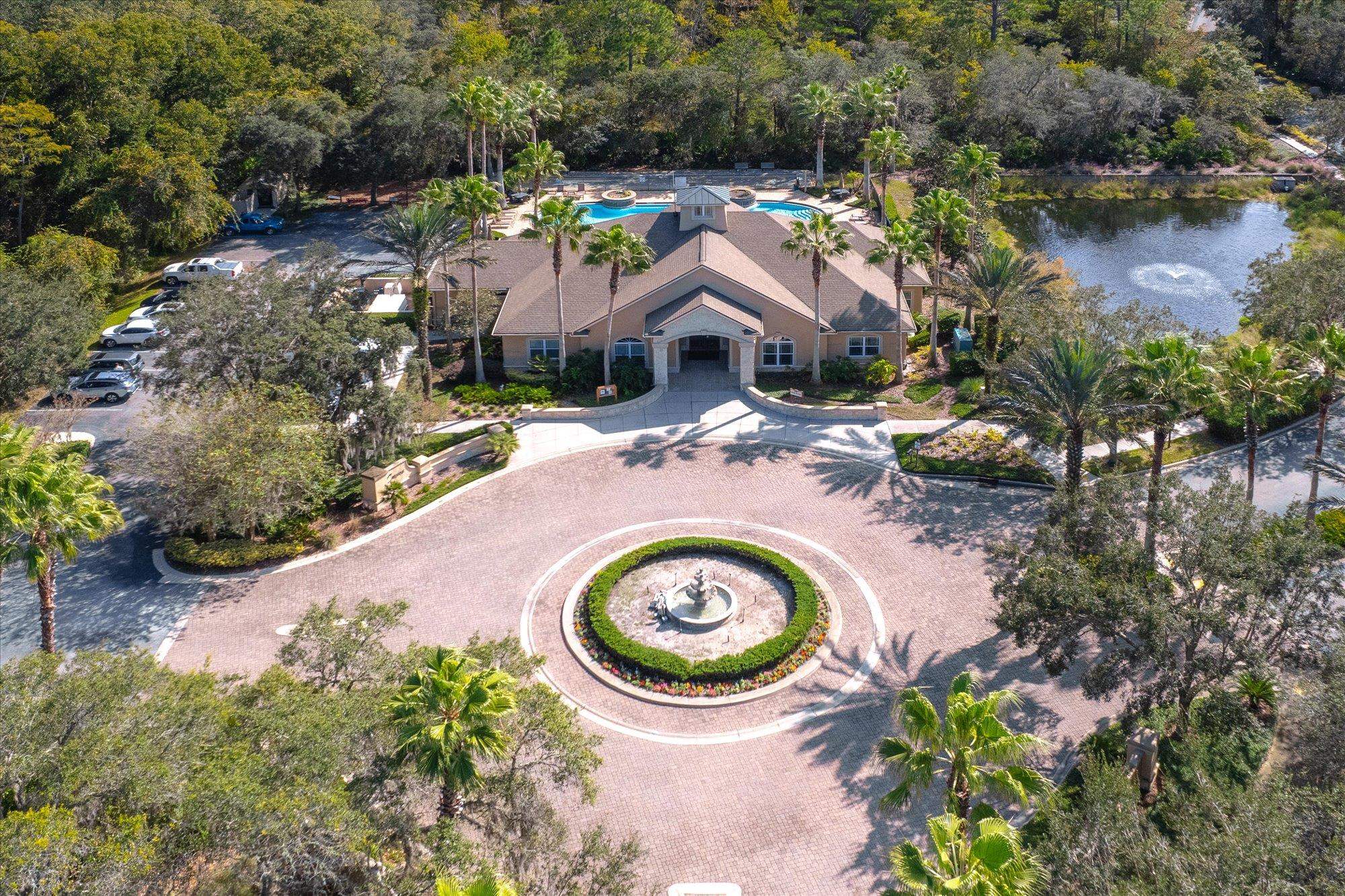 82 Timoga Trail St. Augustine, FL 32084 - Photo 59 of 62 an aerial view of a house with outdoor space and lake view
