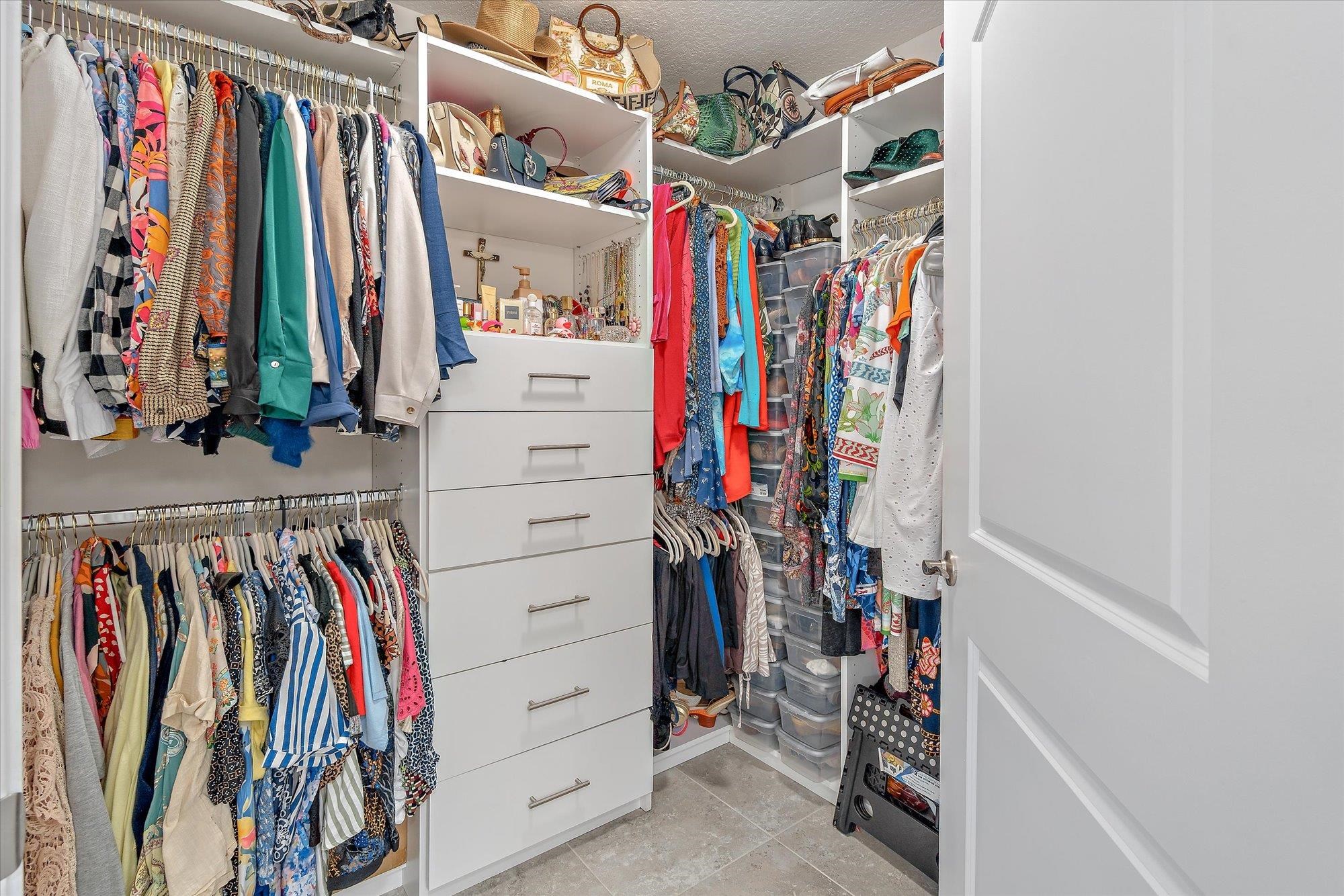 82 Timoga Trail St. Augustine, FL 32084 - Photo 6 of 62 a view of walk in closet with clothes
