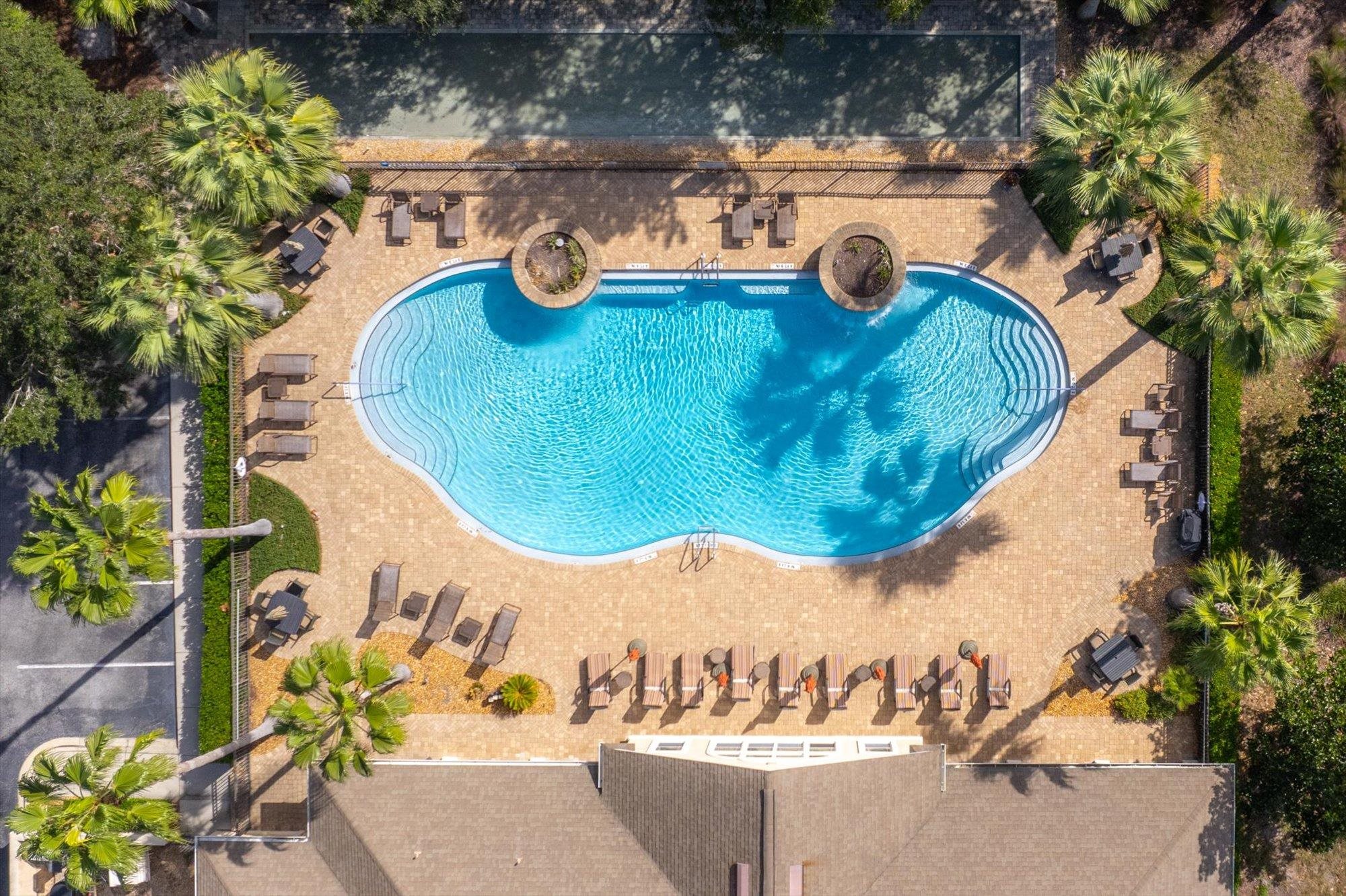 82 Timoga Trail St. Augustine, FL 32084 - Photo 61 of 62 a view of a swimming pool with outdoor seating
